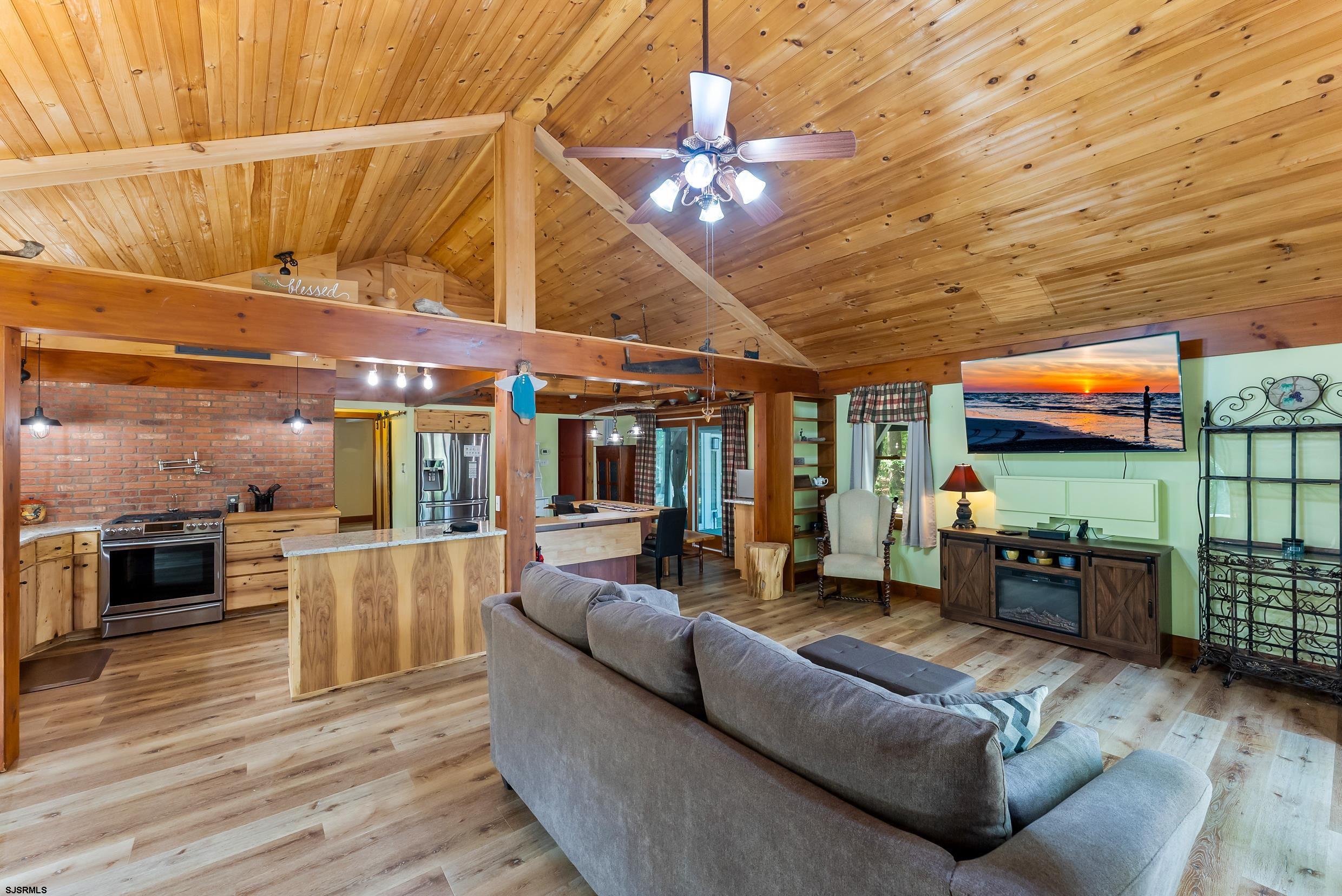 2015 High Bank Road Mays Landing, NJ 08330 - Photo 20 of 89 a living room with fireplace furniture and a flat screen tv