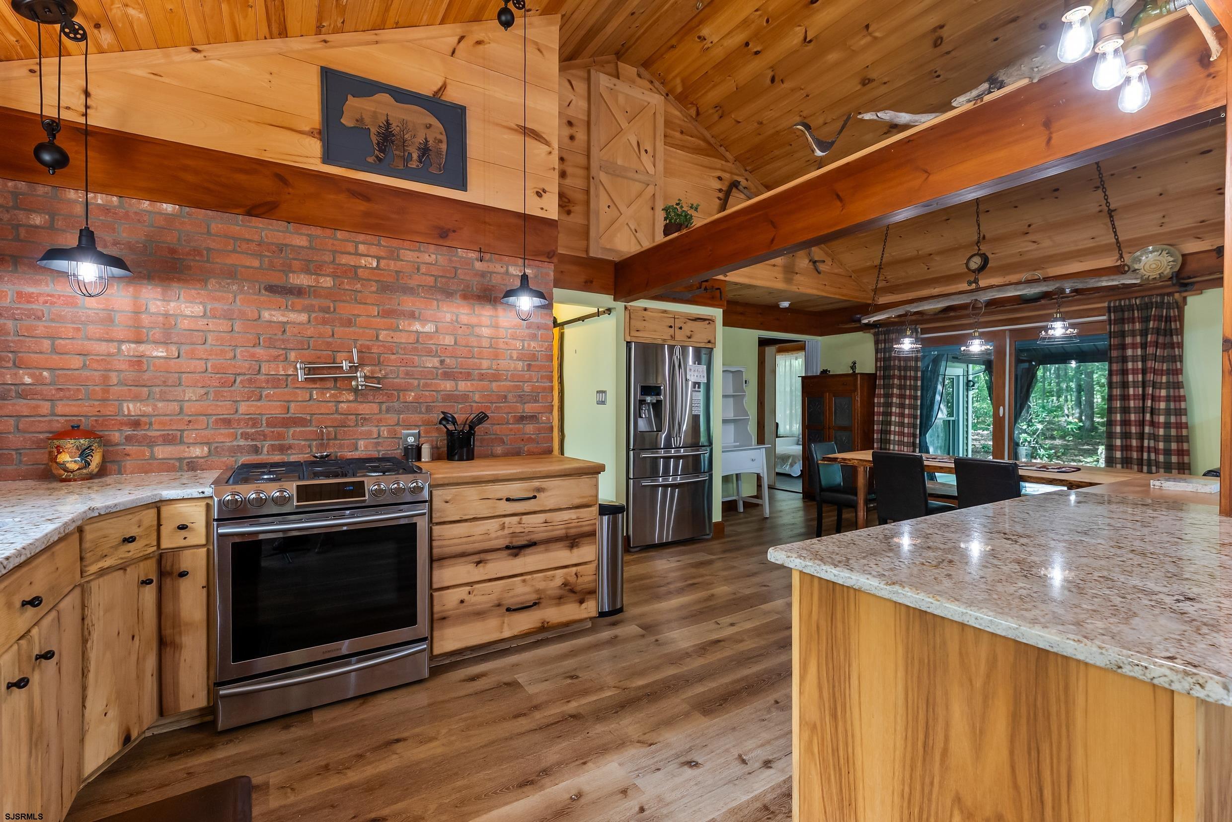 2015 High Bank Road Mays Landing, NJ 08330 - Photo 22 of 89 a open kitchen with stainless steel appliances granite countertop a stove and cabinets