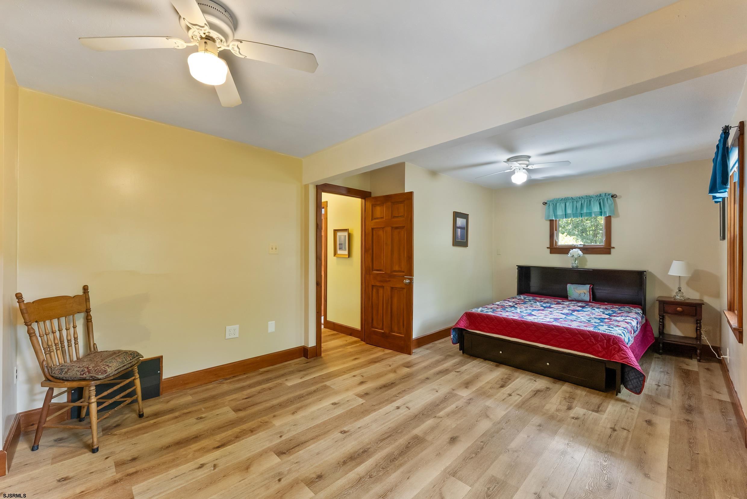 2015 High Bank Road Mays Landing, NJ 08330 - Photo 28 of 89 a bedroom with a bed and wooden floor