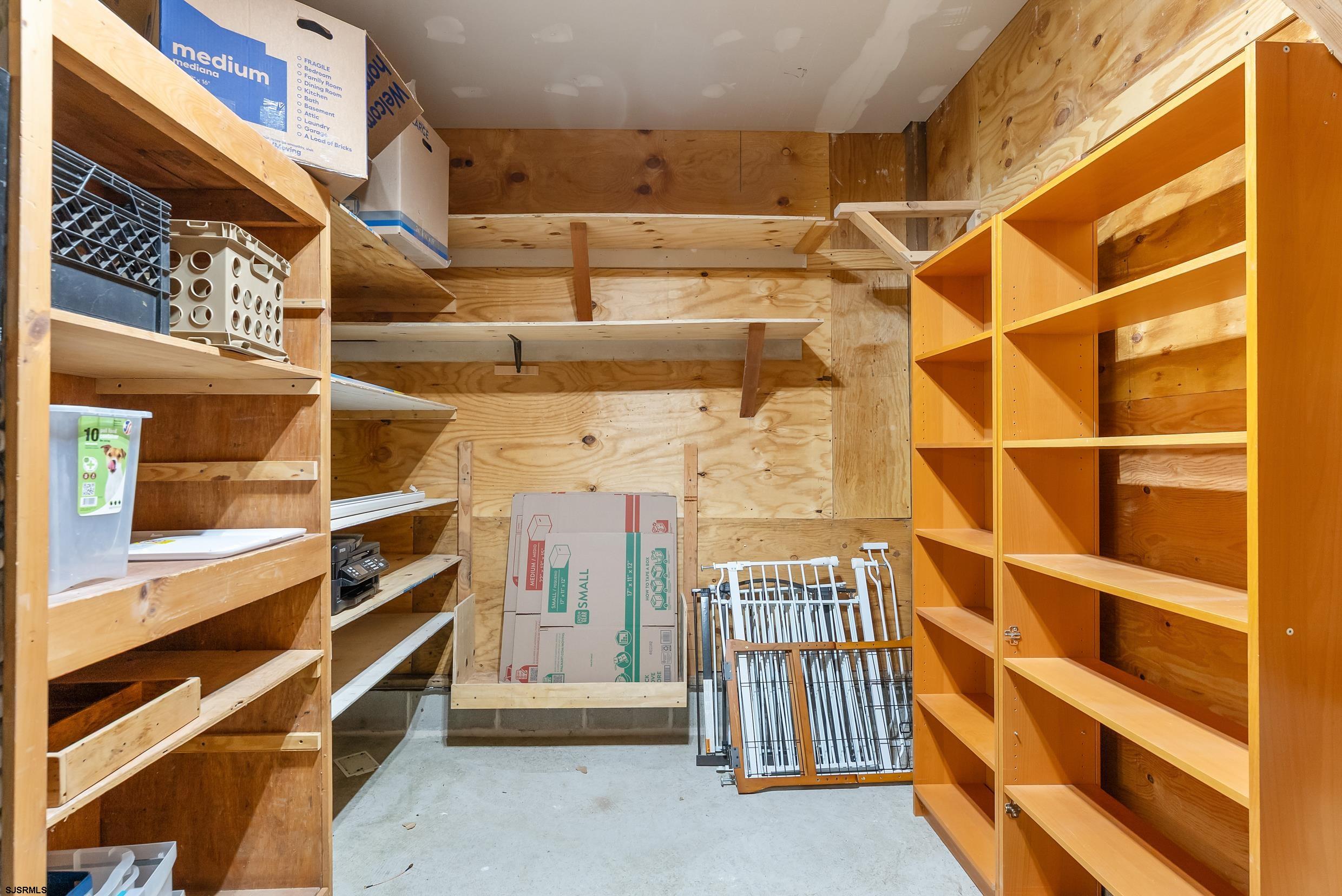 2015 High Bank Road Mays Landing, NJ 08330 - Photo 76 of 89 a view of walk in closet with clothes and shoes