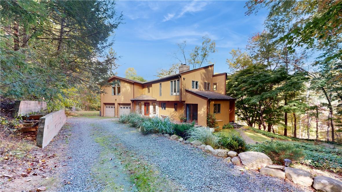 96 Old Pascack Road Pearl River, NY 10965 - Photo 2 of 36 a view of a house with a yard and sitting area