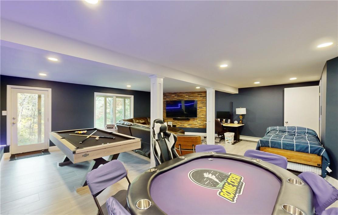 96 Old Pascack Road Pearl River, NY 10965 - Photo 27 of 36 a living room with furniture and a flat screen tv