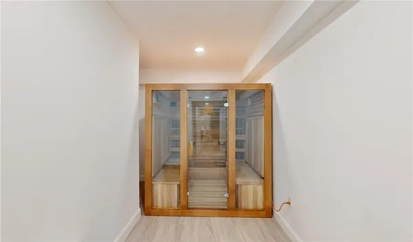 a view of entryway with wooden floor