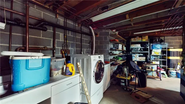 a view of a storage room with washer and dryer