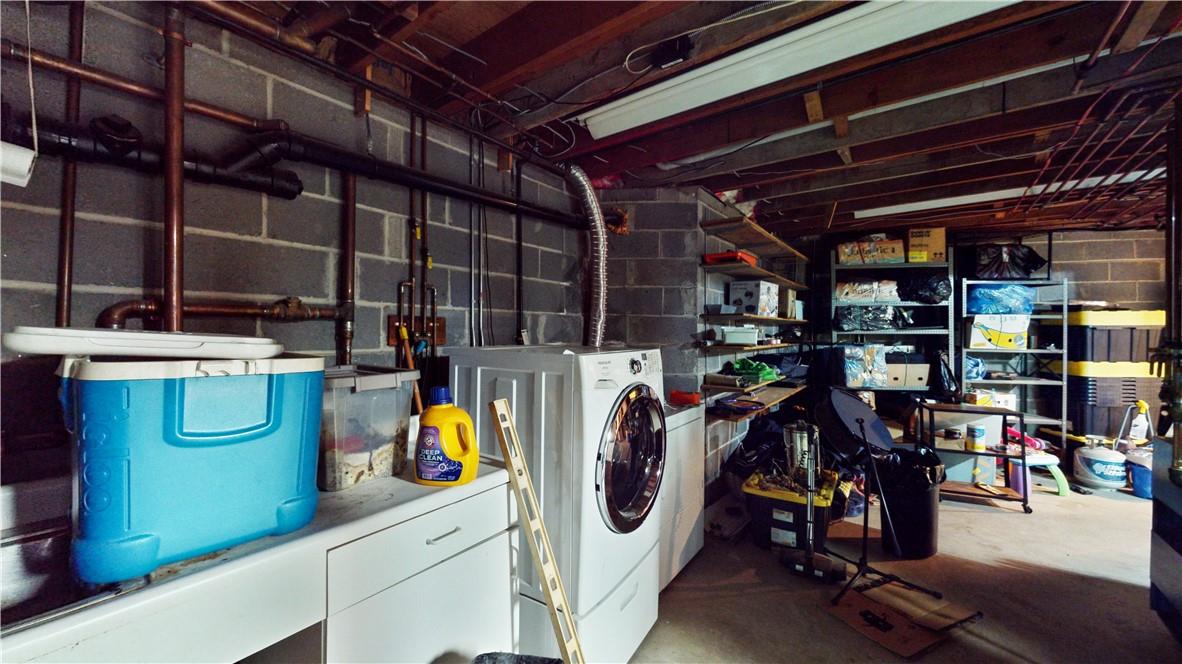 96 Old Pascack Road Pearl River, NY 10965 - Photo 30 of 36 a view of a storage room with washer and dryer