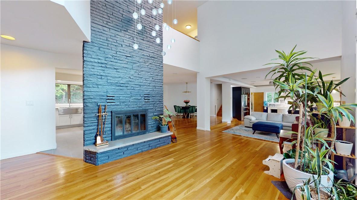 96 Old Pascack Road Pearl River, NY 10965 - Photo 5 of 36 a living room with furniture and a fireplace