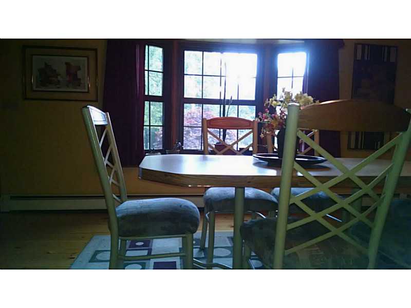 161 Colonial Road Burrillville, RI 02830 - Photo 14 of 22 Dining Room. exceptional pine floors, large bay window lots of light.