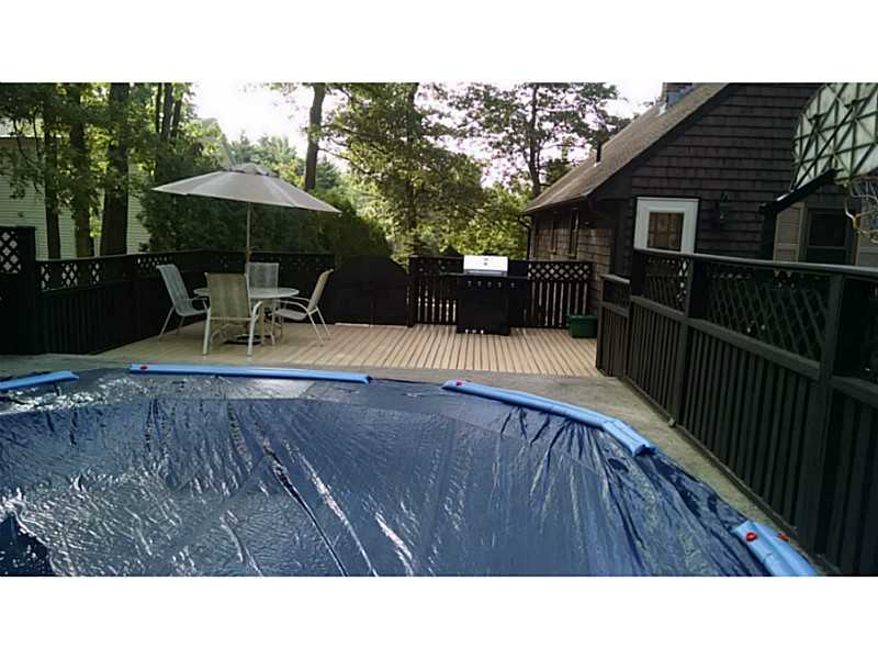 161 Colonial Road Burrillville, RI 02830 - Photo 20 of 22 Patio/Deck. Pool integrated into deck