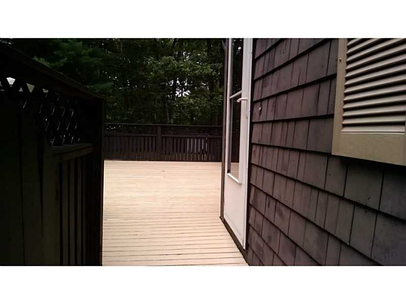 161 Colonial Road Burrillville, RI 02830 - Photo 4 of 22 Patio/Deck. deck entry way with door to kitchen