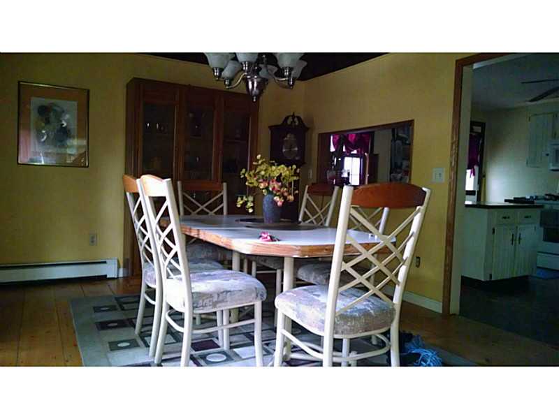 161 Colonial Road Burrillville, RI 02830 - Photo 7 of 22 Dining Room. Large dining room with pine floors