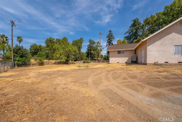 a house view with a garden space