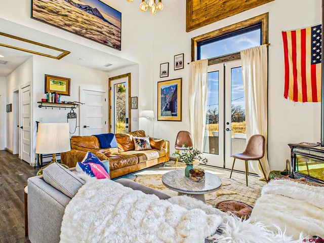 a bedroom with furniture and a bed