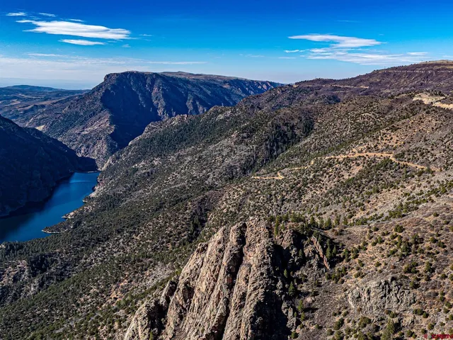 a view of a backyard of the house