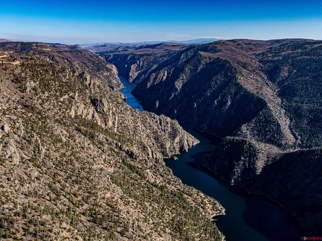a view of mountain with lake view