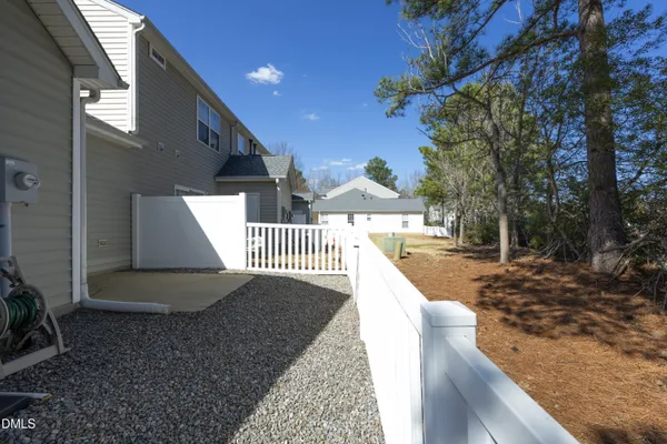 a view of a wooden fence