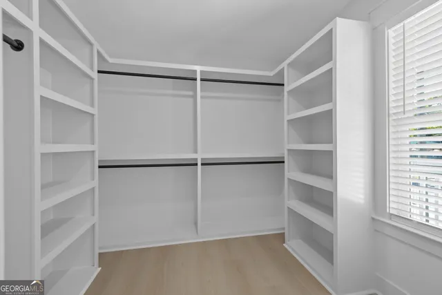a view of an empty walk in closet