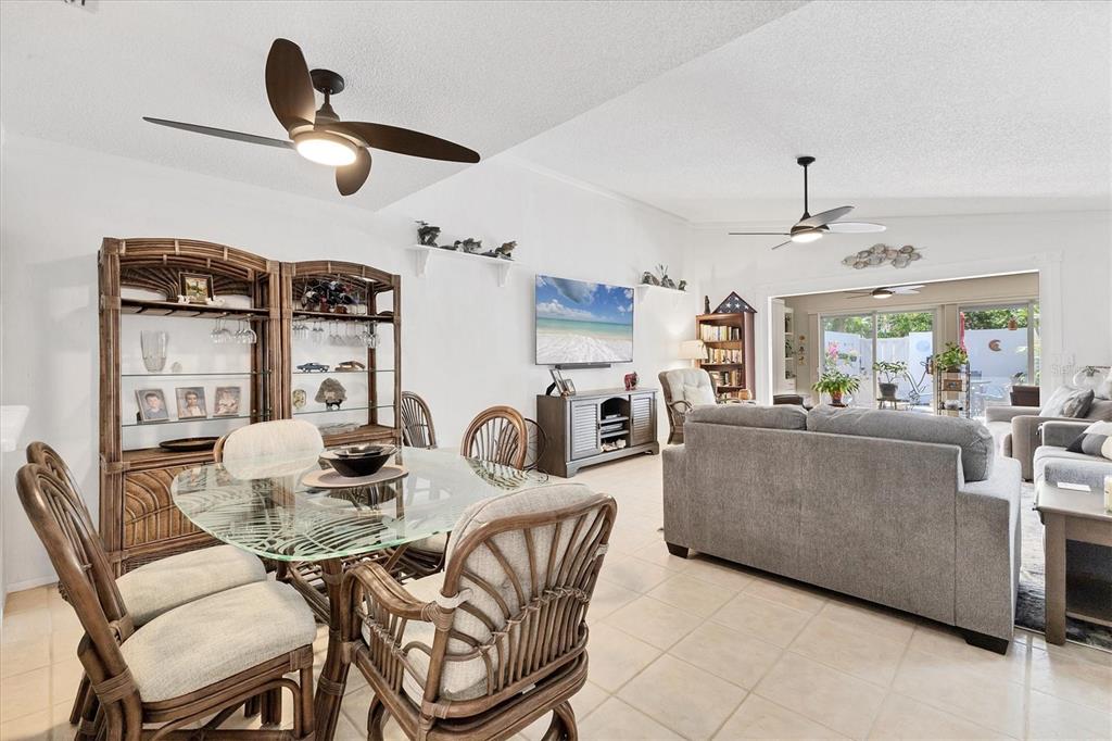 6304 Pelican Drive Bradenton, FL 34210 - Photo 14 of 42 a living room with furniture and kitchen view