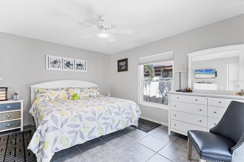 6304 Pelican Drive Bradenton, FL 34210 - Photo 23 of 42 a bedroom with a bed and furniture