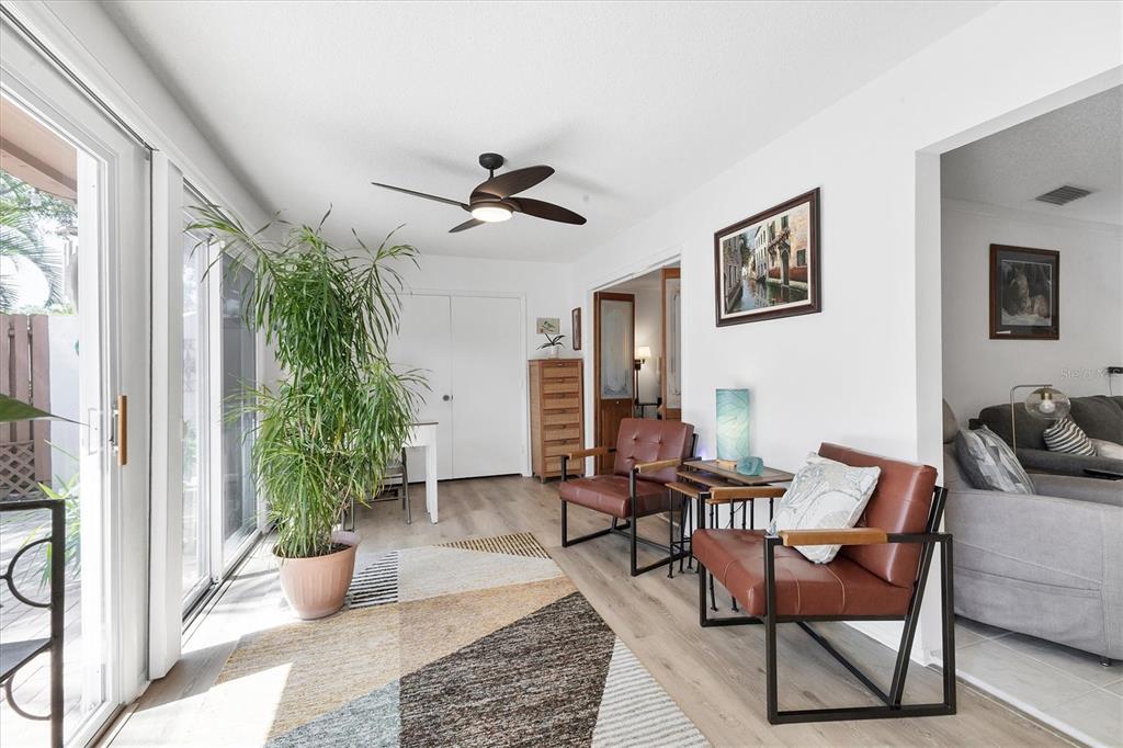 6304 Pelican Drive Bradenton, FL 34210 - Photo 28 of 42 a living room with furniture and a potted plant