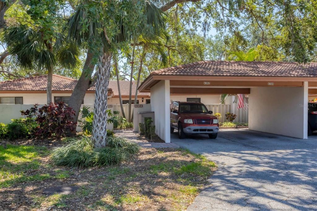 6304 Pelican Drive Bradenton, FL 34210 - Photo 3 of 42 a view of car parked in back of white house