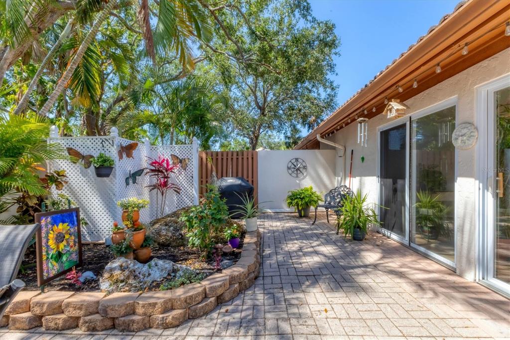 6304 Pelican Drive Bradenton, FL 34210 - Photo 31 of 42 a front view of a house with garden