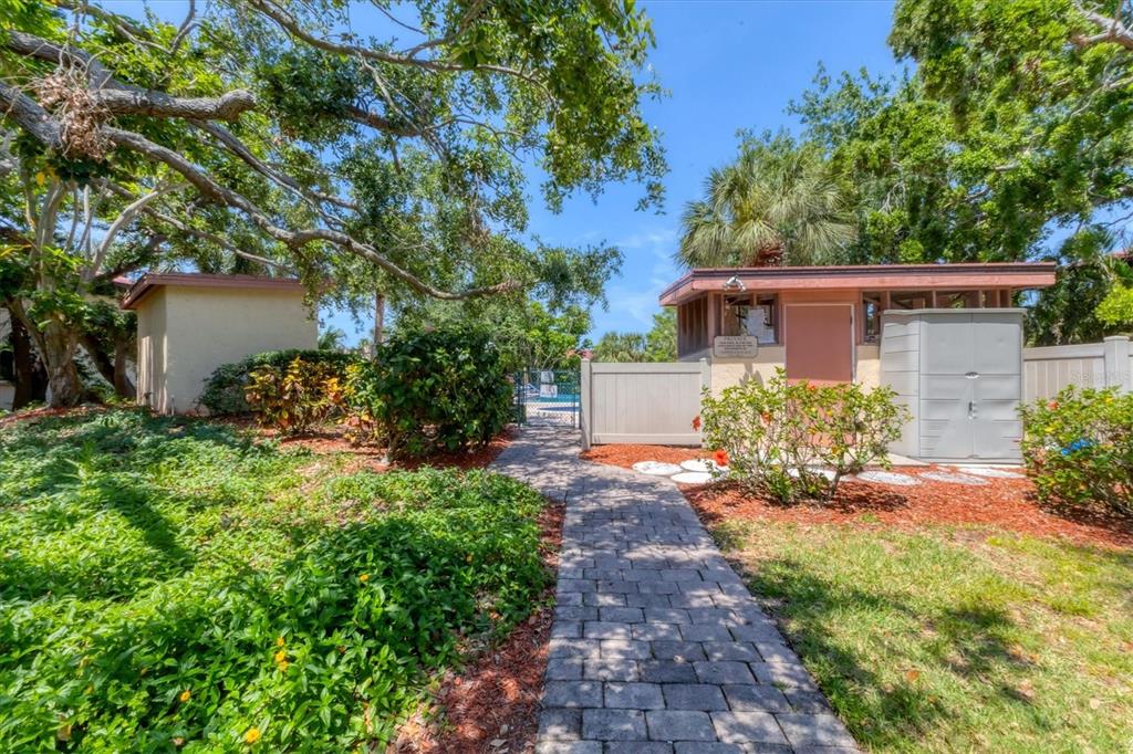 6304 Pelican Drive Bradenton, FL 34210 - Photo 35 of 42 a front view of a house with a yard