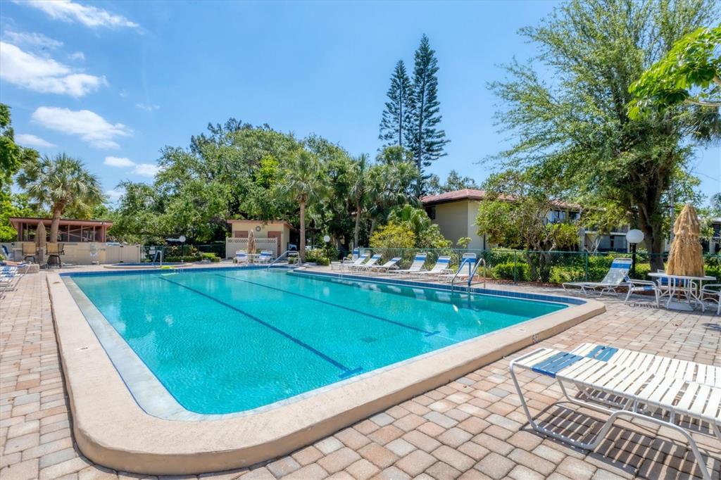 6304 Pelican Drive Bradenton, FL 34210 - Photo 36 of 42 a view of a swimming pool with a patio