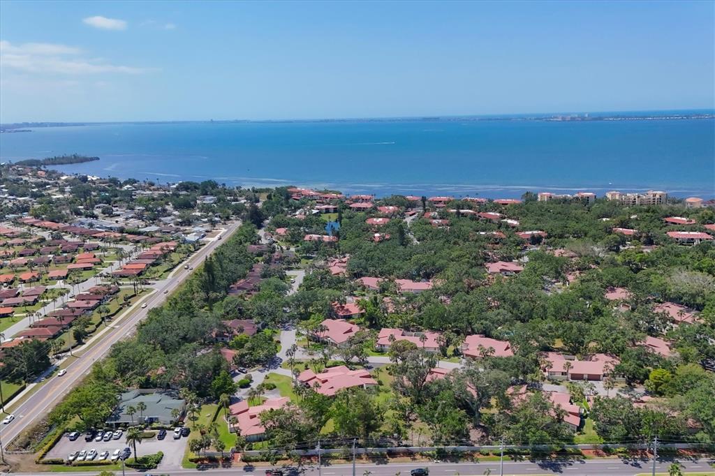 6304 Pelican Drive Bradenton, FL 34210 - Photo 38 of 42 an aerial view of a city and ocean