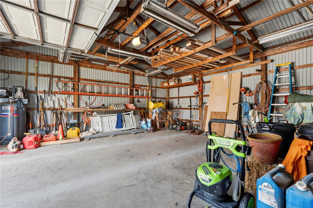 4971 Lackey Road Cedarville, OH 45314 - Photo 13 of 79 This spacious utility building offers ample room for storage and projects.