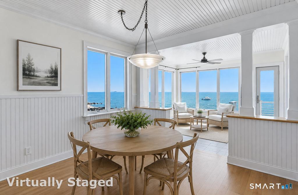 167 Shore Road Clinton, CT 06413 - Photo 11 of 40 Large area for informal dining opens to a beautiful sunroom