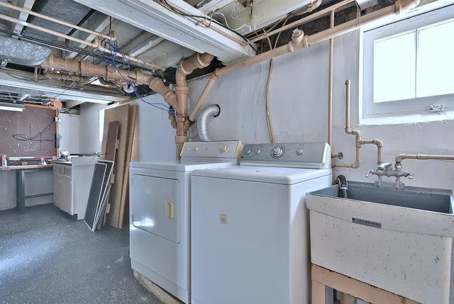 a view of a patio with table and chairs and potted plants