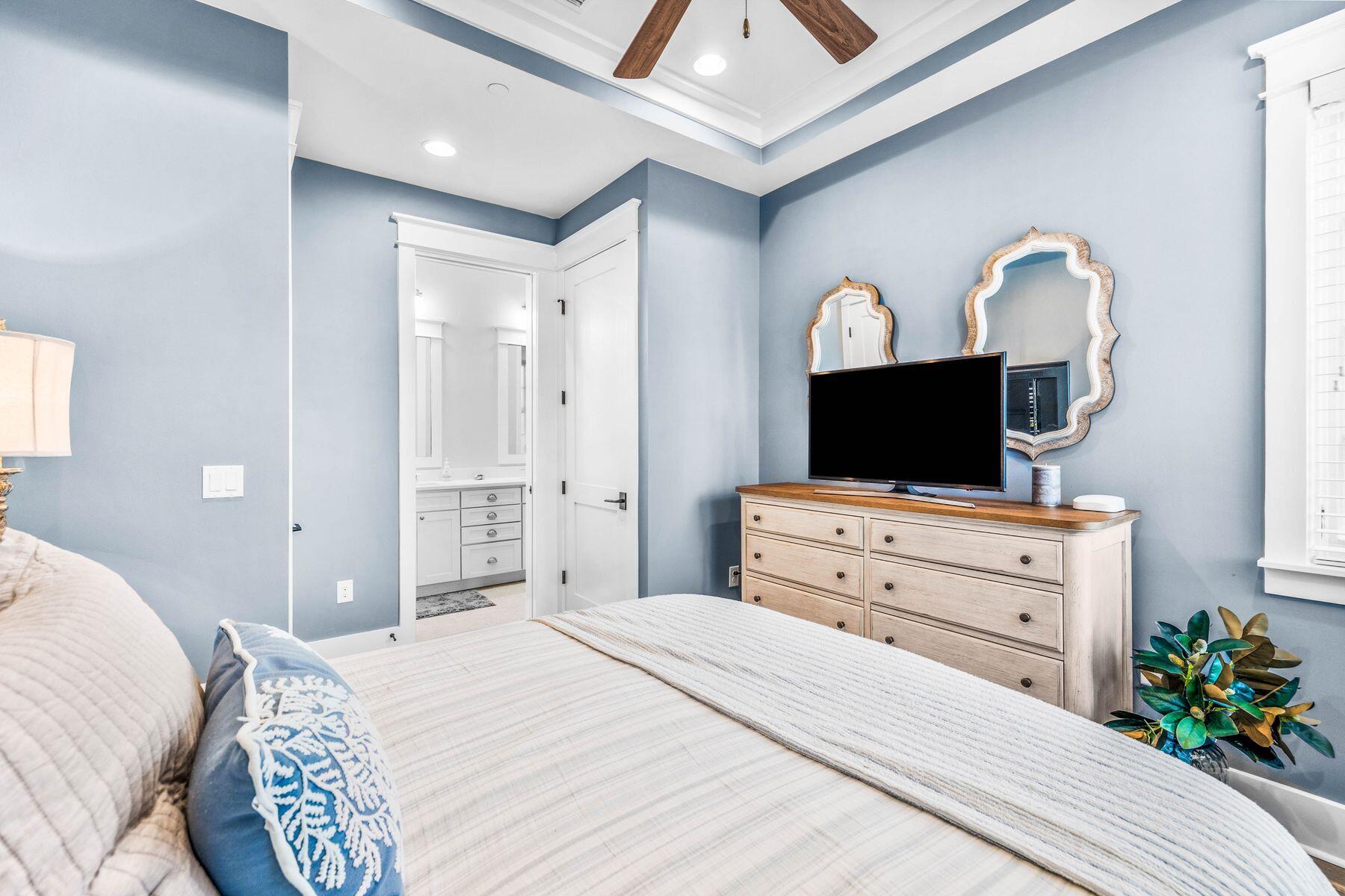 79 Cedar Post Road Santa Rosa Beach, FL 32459 - Photo 16 of 55 a bedroom with a bed and a flat screen tv