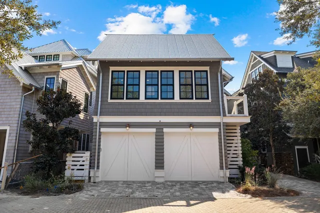 an aerial view of a house with a garden
