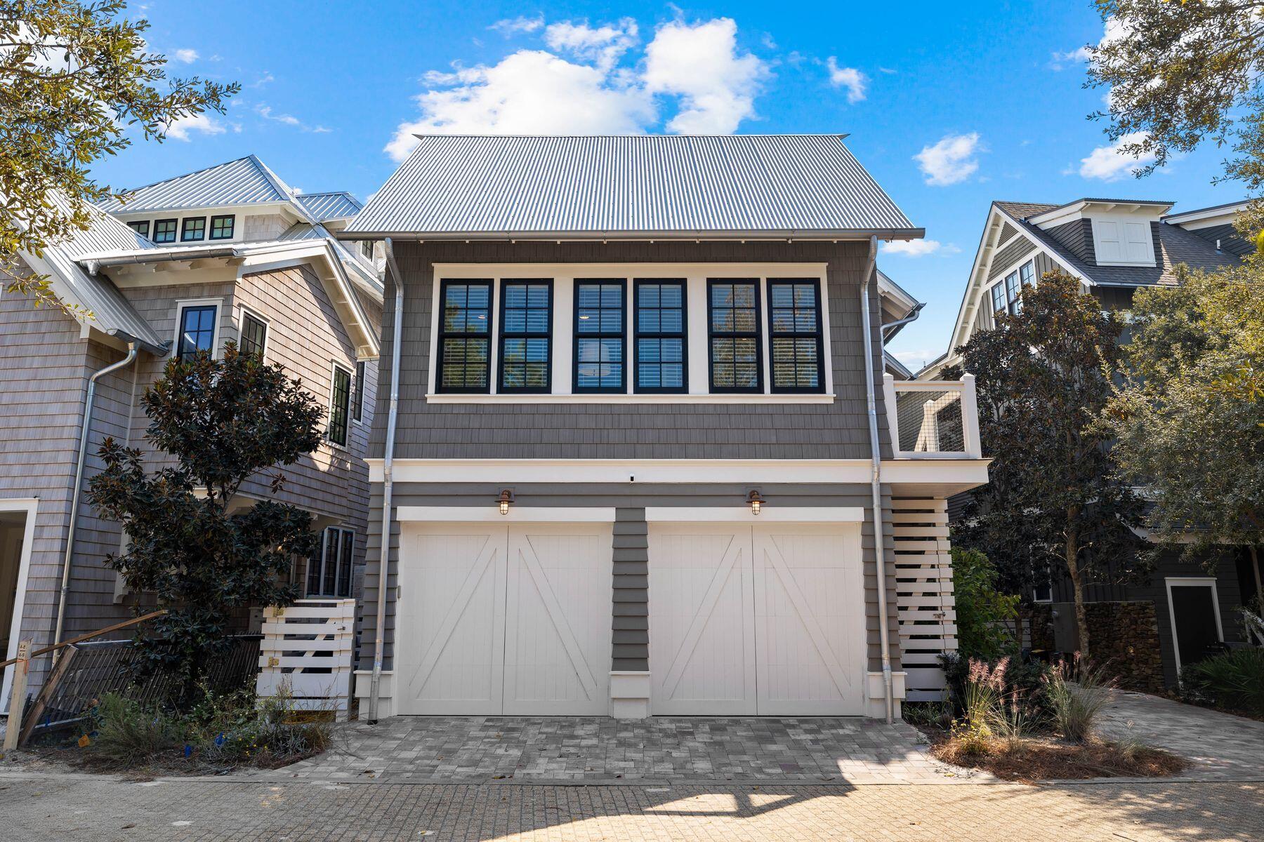 79 Cedar Post Road Santa Rosa Beach, FL 32459 - Photo 41 of 55 a front view of a house with a yard