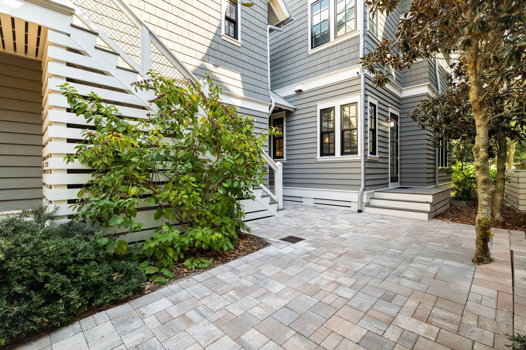 79 Cedar Post Road Santa Rosa Beach, FL 32459 - Photo 42 of 55 a backyard of a house with plants and trees