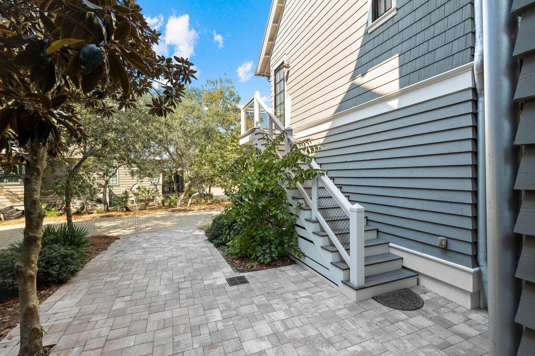 79 Cedar Post Road Santa Rosa Beach, FL 32459 - Photo 43 of 55 a pathway of a house with yard and tree s