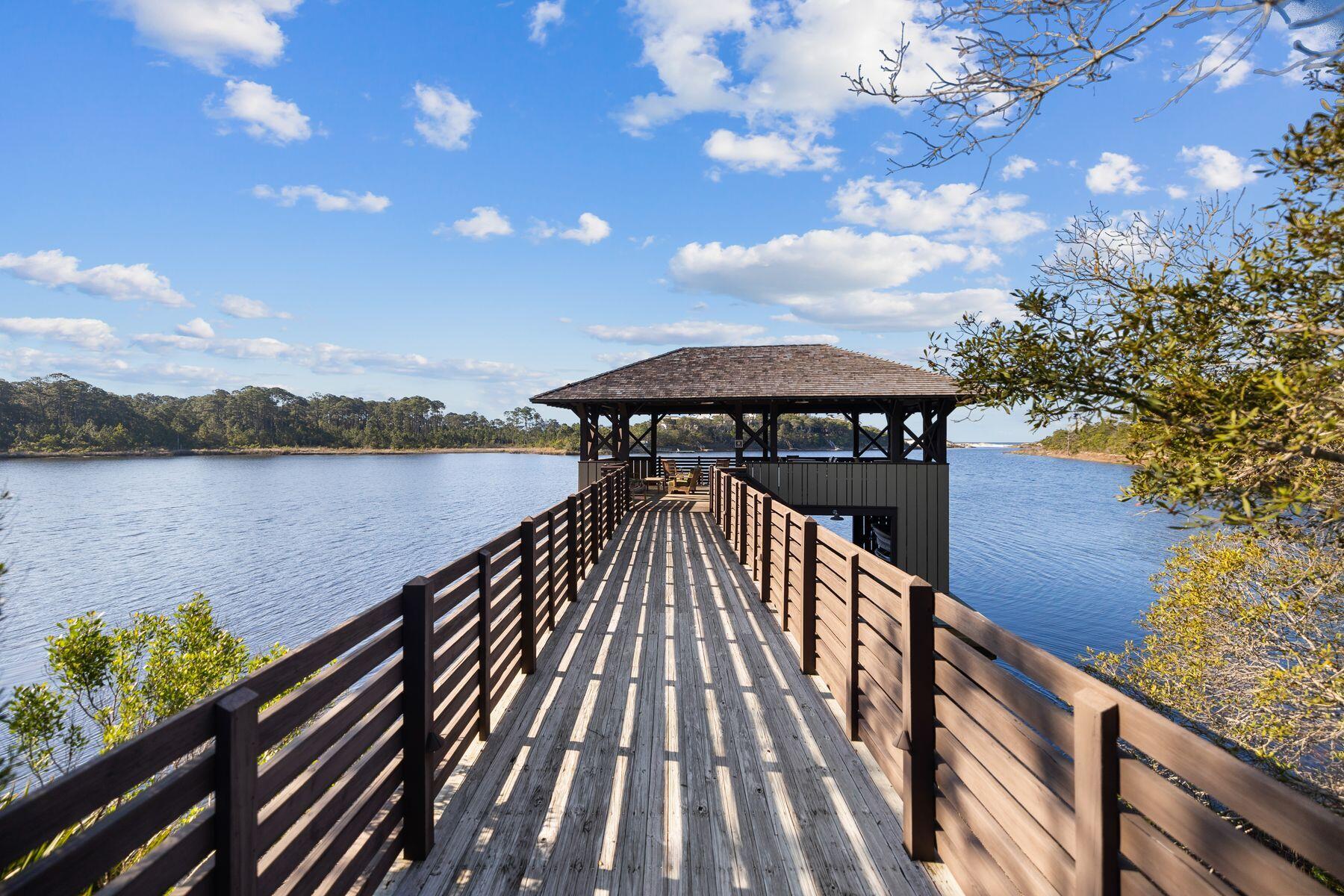 79 Cedar Post Road Santa Rosa Beach, FL 32459 - Photo 48 of 55 a view of wooden floor with a lake view