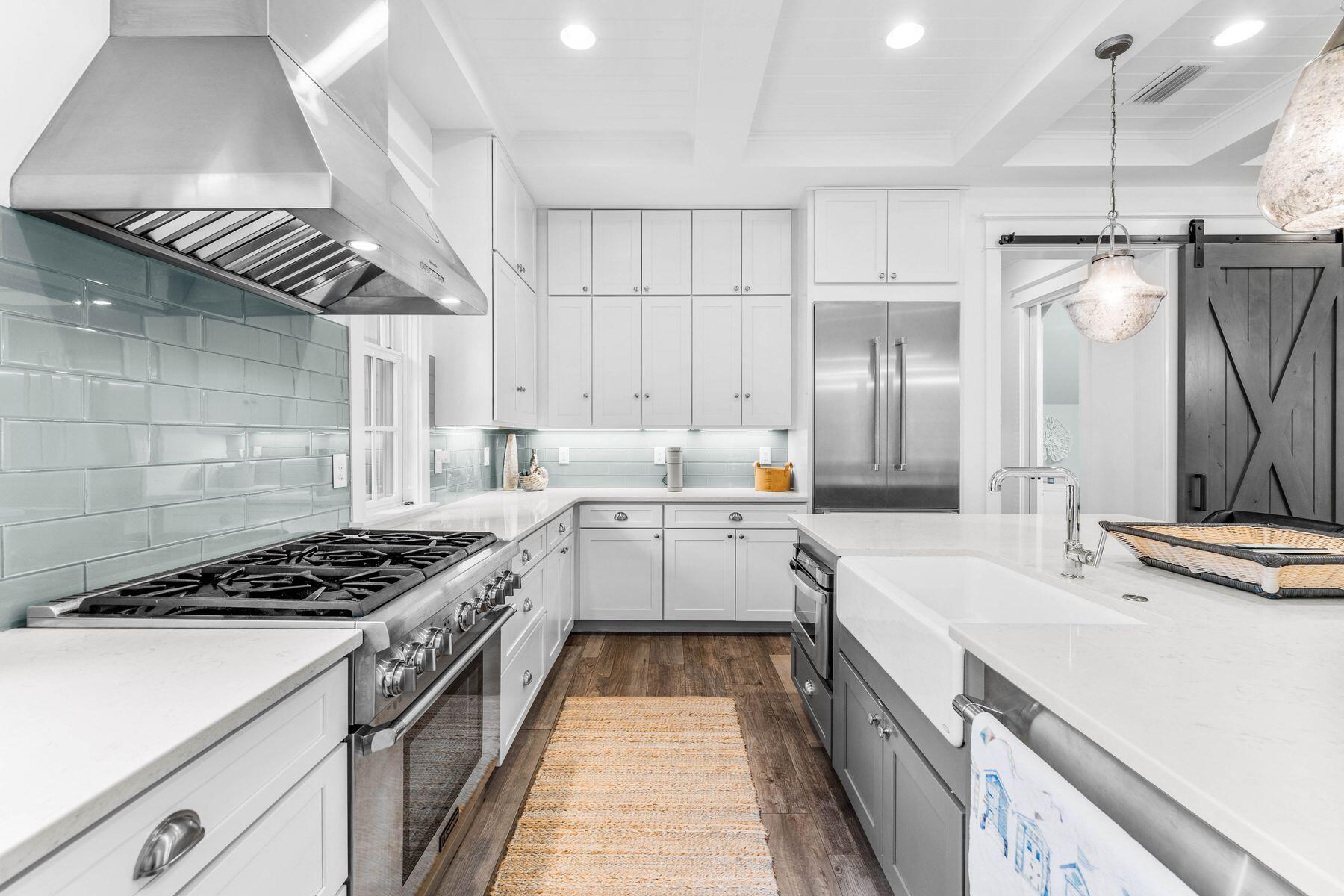 79 Cedar Post Road Santa Rosa Beach, FL 32459 - Photo 10 of 55 a kitchen with a sink stove and cabinets