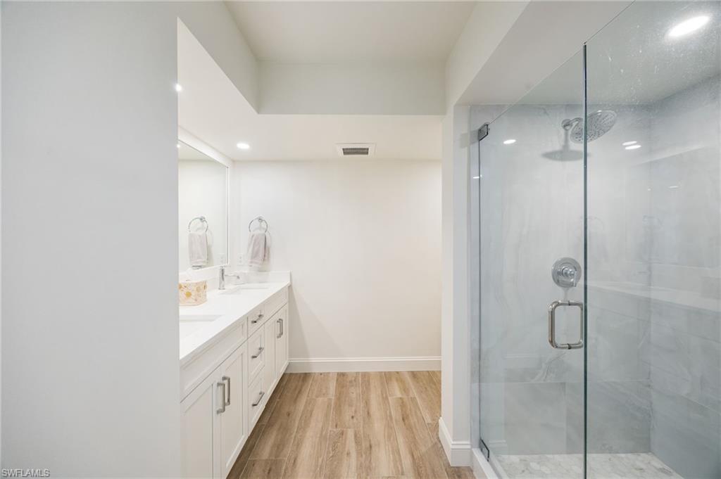 383 Harbour Drive, Unit 101 Naples, FL 34103 - Photo 14 of 30 Master bathroom with large shower area