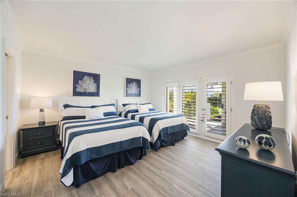 383 Harbour Drive, Unit 101 Naples, FL 34103 - Photo 15 of 30 Second Bedroom with ensuite bath