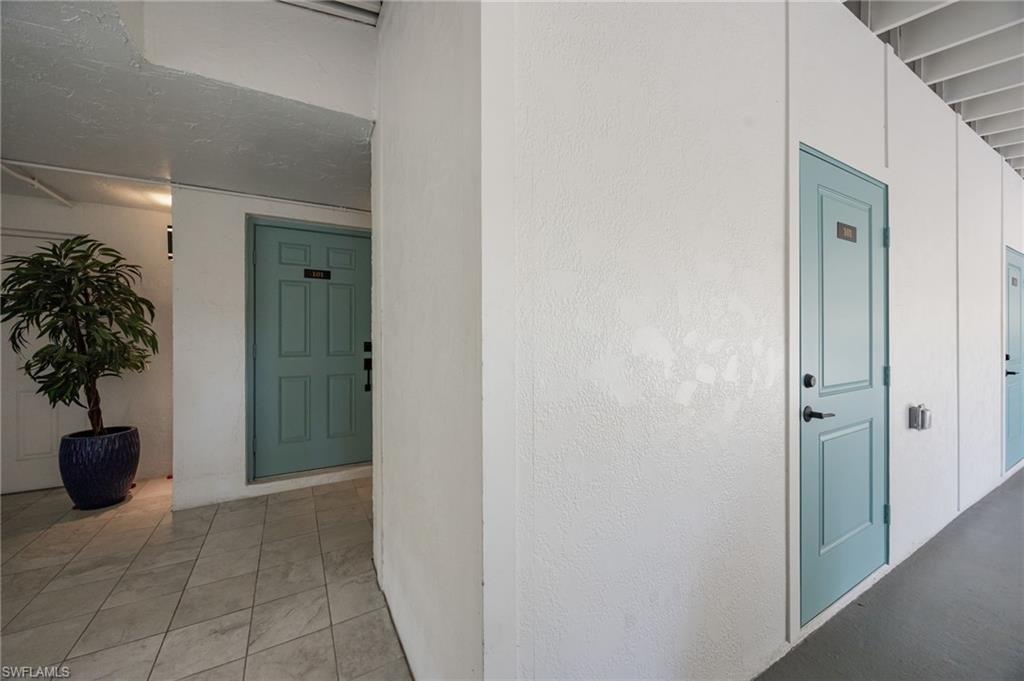 383 Harbour Drive, Unit 101 Naples, FL 34103 - Photo 23 of 30 Front Door, Spacious 11x4 storage unit, with covered parking space within 20 feet from door