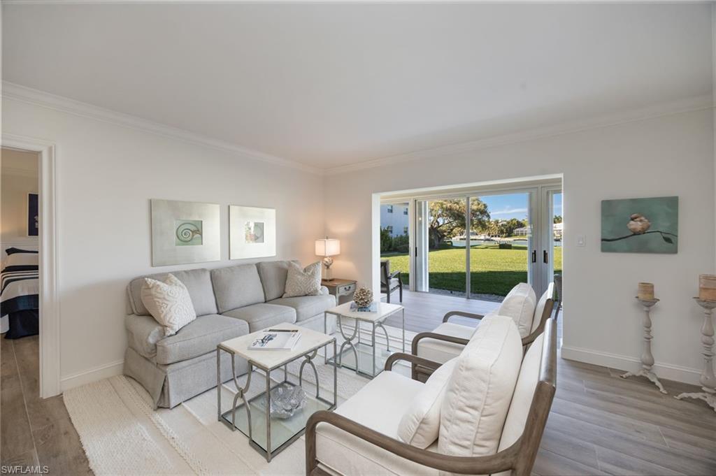 383 Harbour Drive, Unit 101 Naples, FL 34103 - Photo 3 of 30 Enjoy stunning view of the Bay from great room