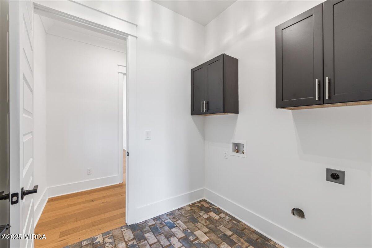 104 Piedmont Circle Forsyth, GA 31029 - Photo 18 of 42 a bathroom with a sink and a shower