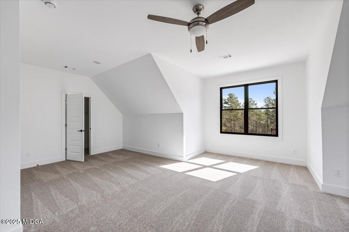 104 Piedmont Circle Forsyth, GA 31029 - Photo 27 of 42 a view of an empty room with a window