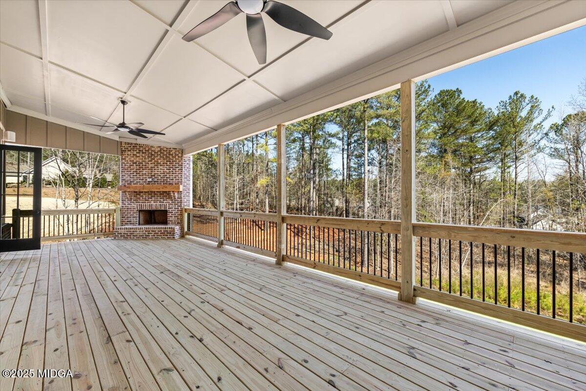 104 Piedmont Circle Forsyth, GA 31029 - Photo 32 of 42 a view of a porch with wooden floor and outdoor space