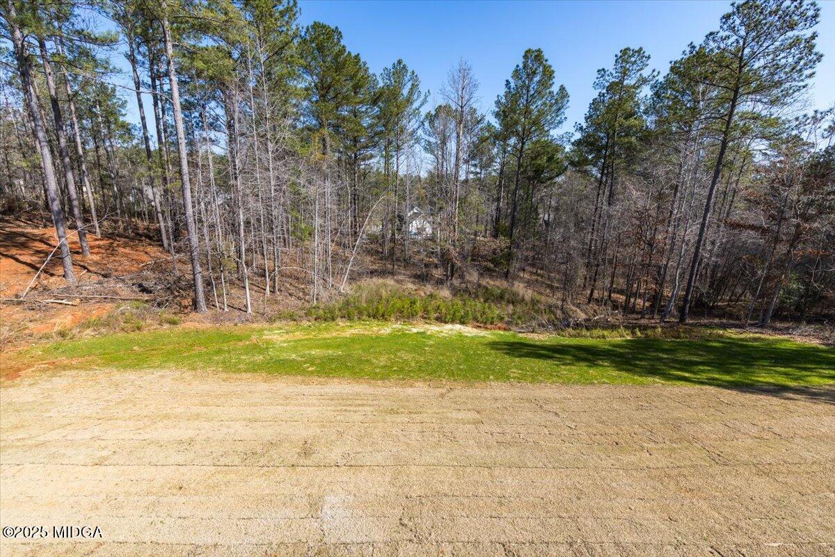 104 Piedmont Circle Forsyth, GA 31029 - Photo 34 of 42 a view of swimming pool with an outdoor space and seating area