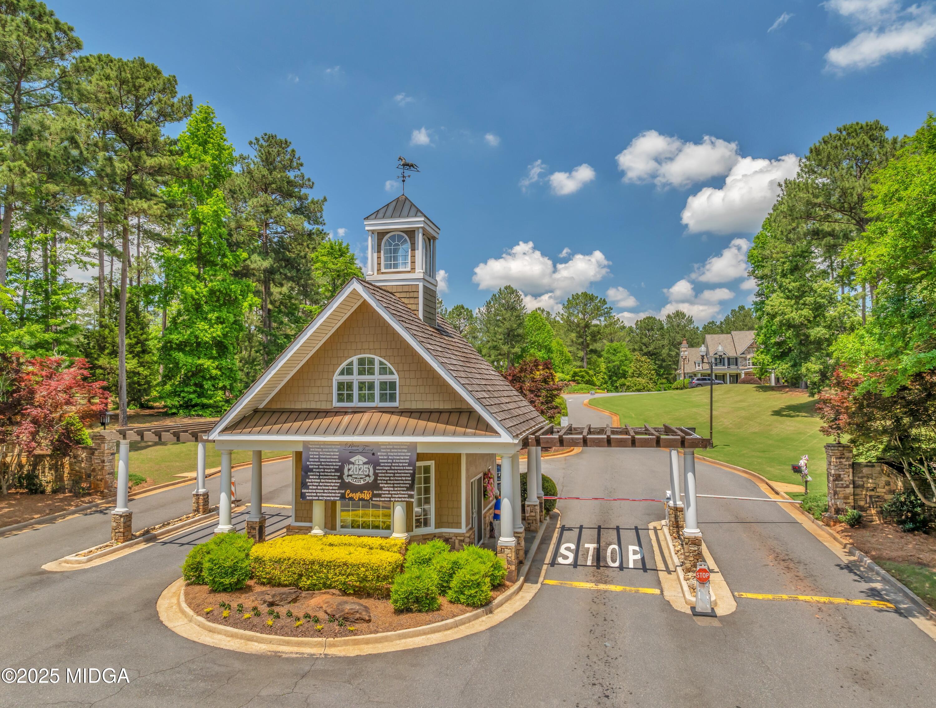 104 Piedmont Circle Forsyth, GA 31029 - Photo 36 of 42 a front view of a house with a yard