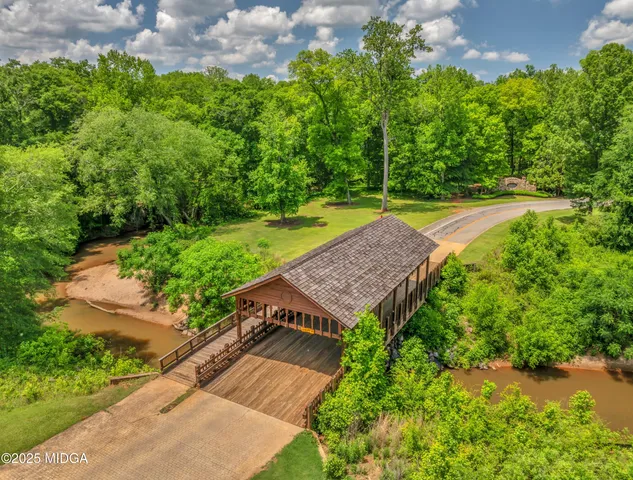 a view of a backyard with a garden