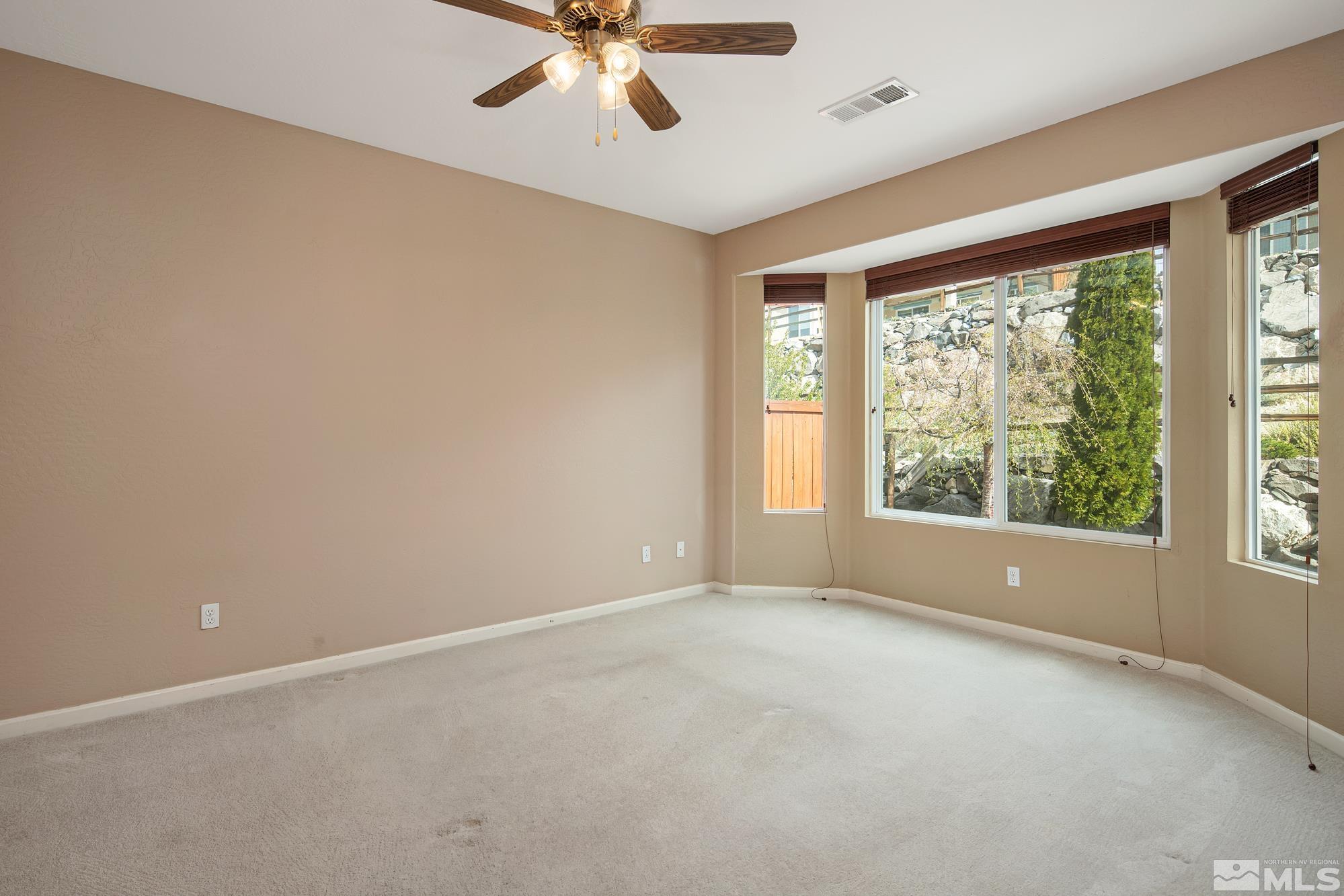 1180 Meridian Ranch Drive Reno, NV 89523 - Photo 16 of 28 a view of an empty room with a window