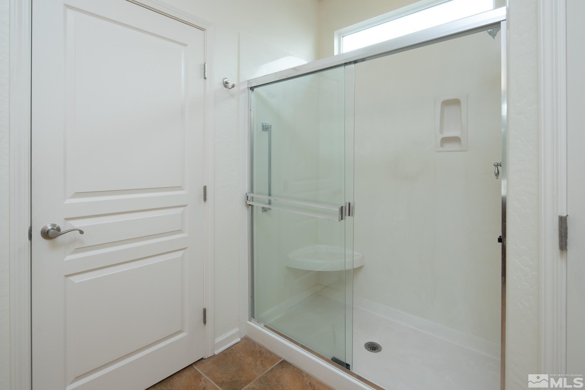 1180 Meridian Ranch Drive Reno, NV 89523 - Photo 21 of 28 a bathroom with a shower